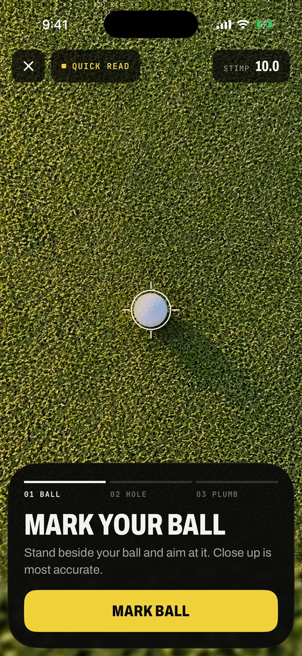 Mark your ball: the crosshair locked on a golf ball on the green